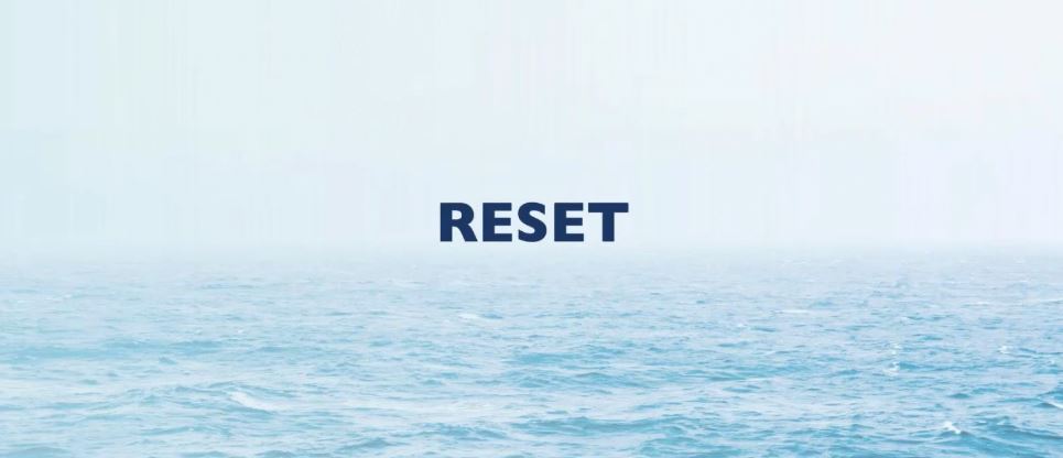 Water with the word reset in the middle