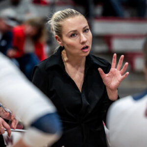 Coach giving instructions to team