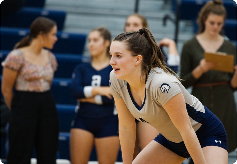 Woman volleyball player looking focused