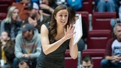 Dana Hallisey coaching on the sideline