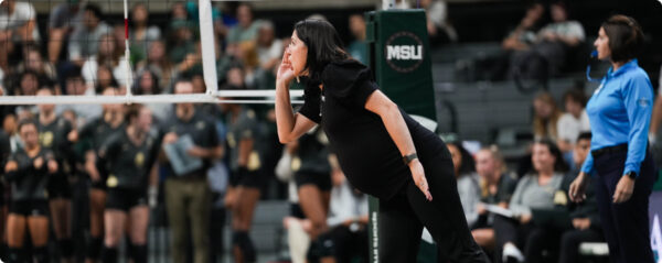 Volleyball coach on sidelines