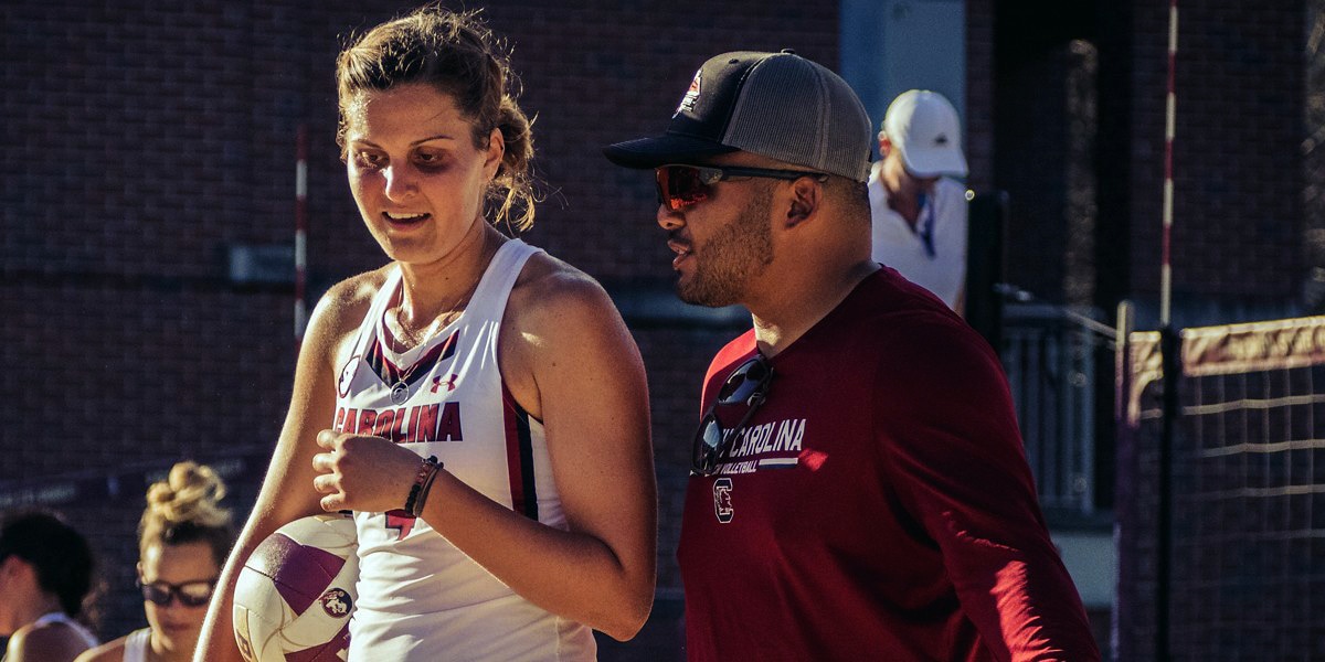 Beach Volleyball Coach Talking to Player