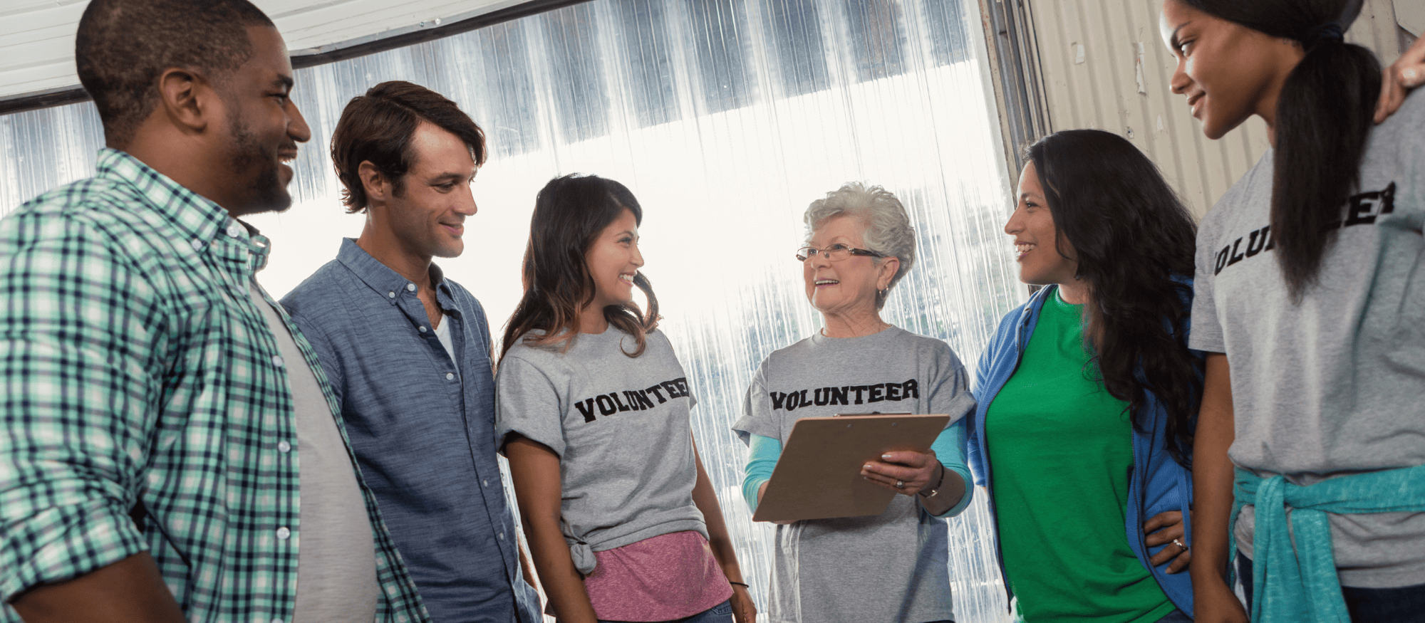 Group of volunteers gathered around