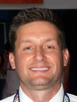 Jordan Vidovic of Marist (IL) High School is the 2025 AVCA Boys High School Volleyball MIDWEST REGION COACH OF THE YEAR and the 2025 AVCA National Boys High School Volleyball Coach of the Year.