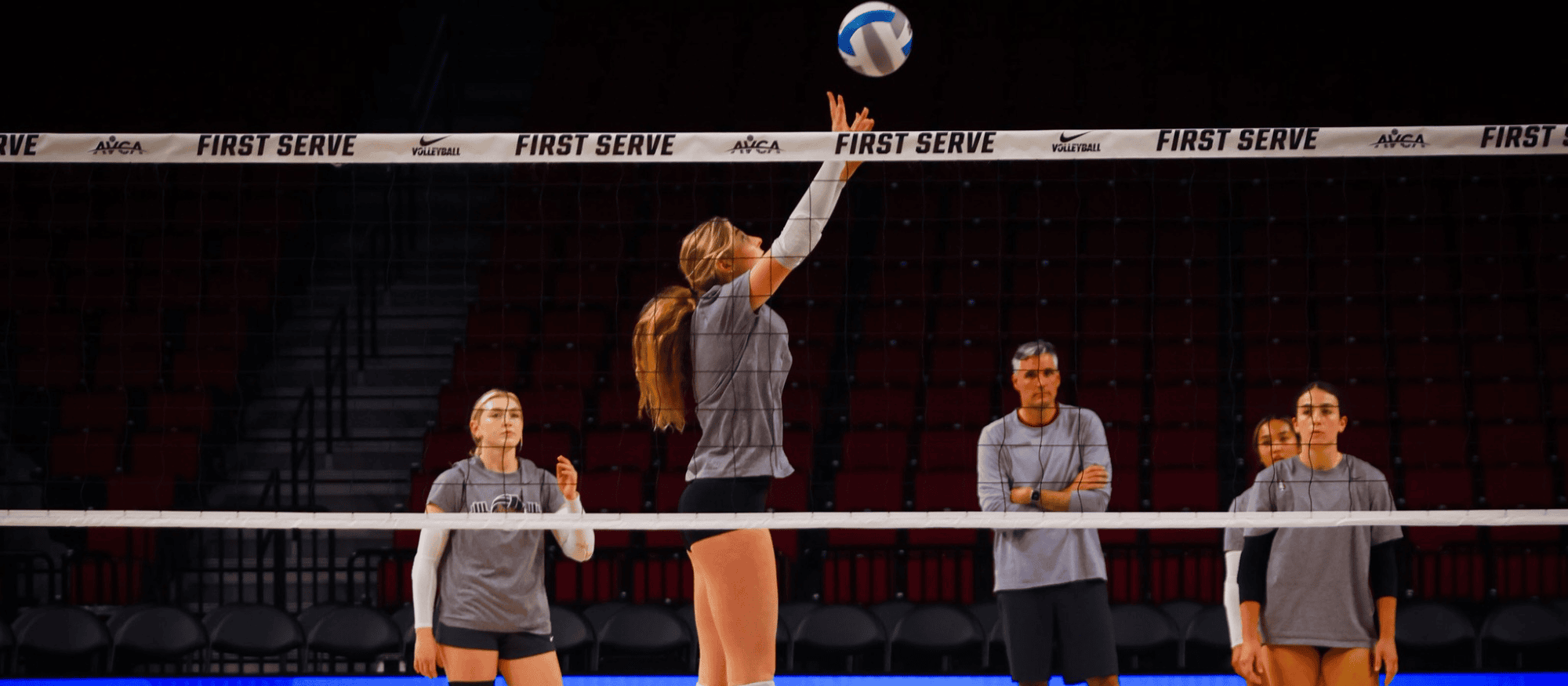 Stanford volleyball player setting at practice