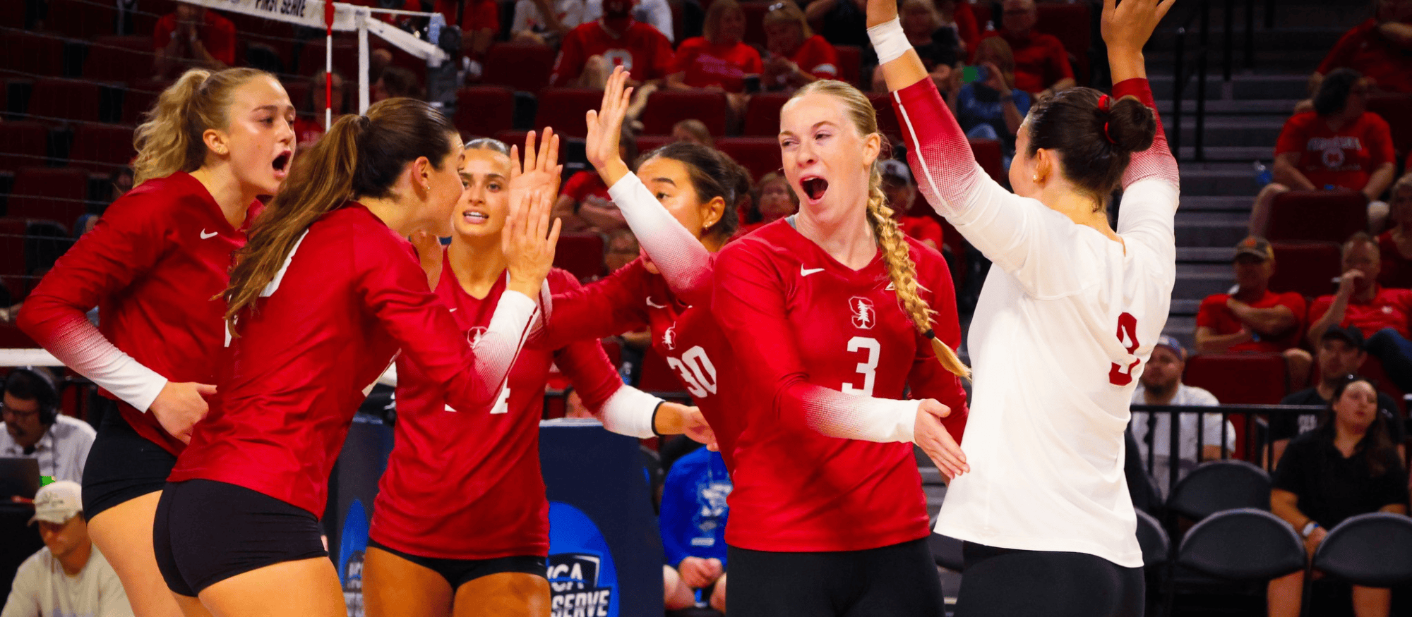 Stanford volleyball team celebrating