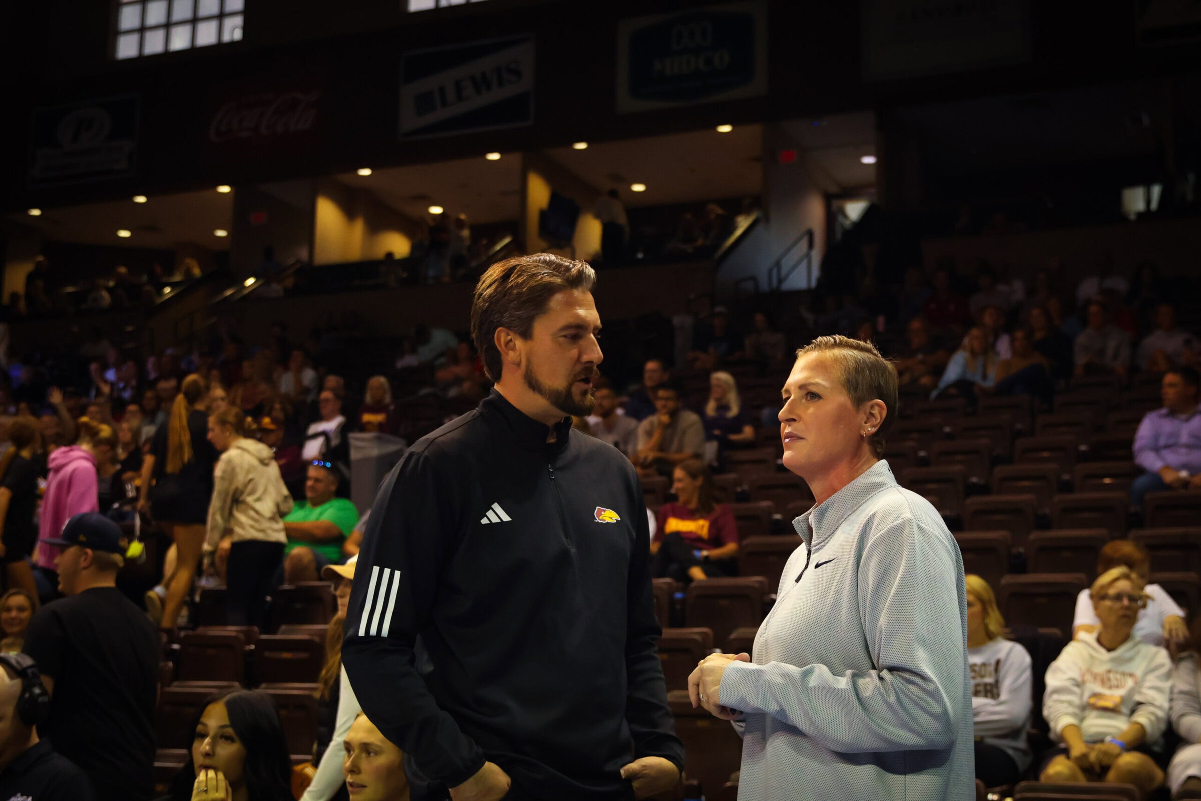 Katie Schumacher-Cawley & Matt Ulmer having a pre-game conversation