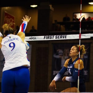 Kansas Volleyball Player blocking the ball