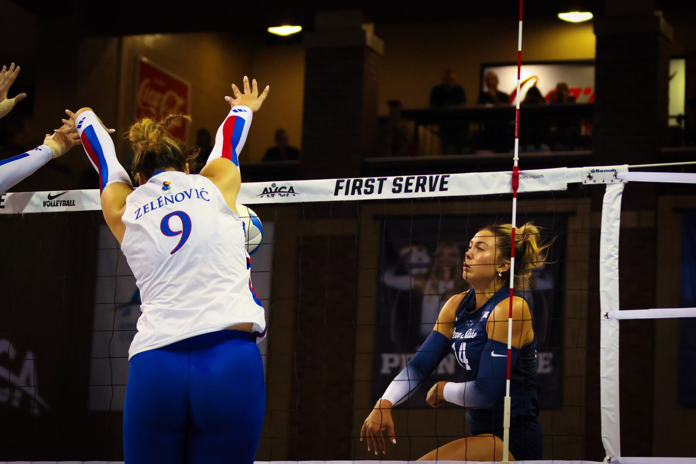 Kansas Volleyball Player blocking the ball
