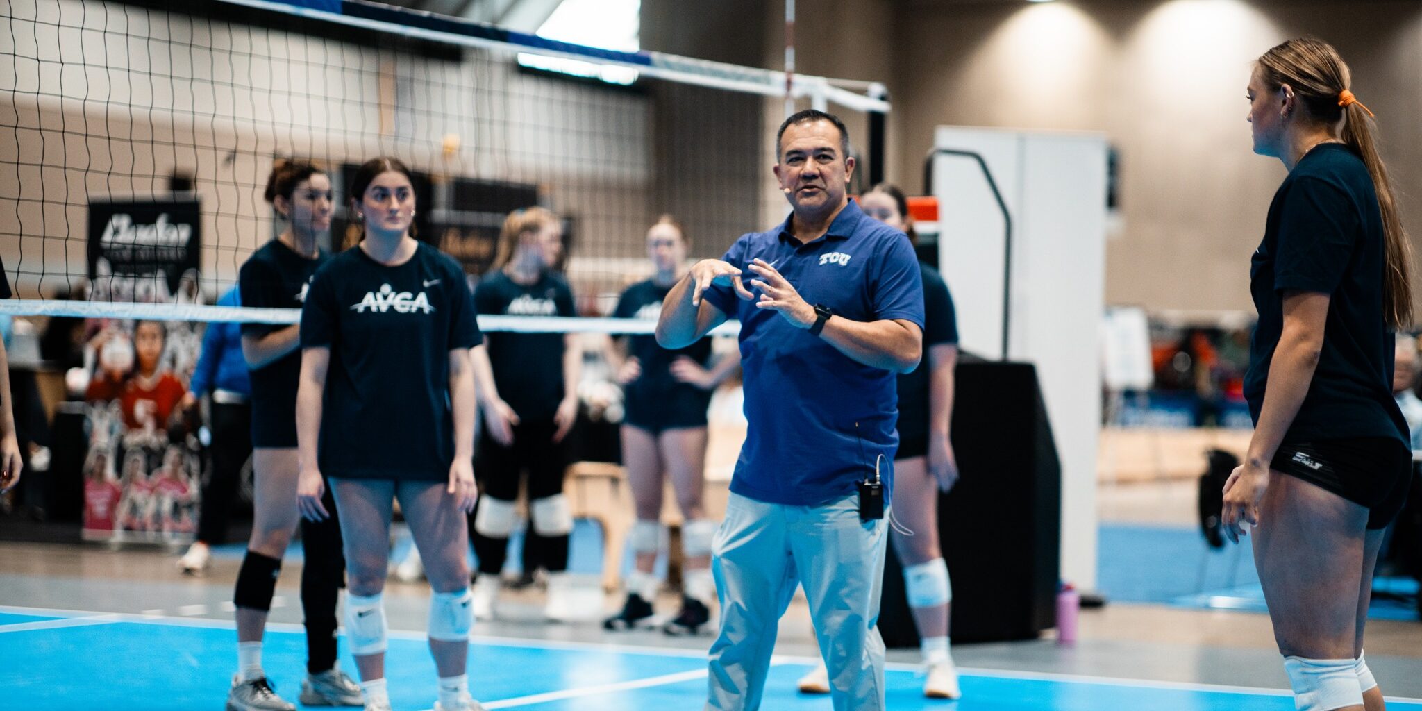 Jason Williams presenting an on-court session at AVCA Convention