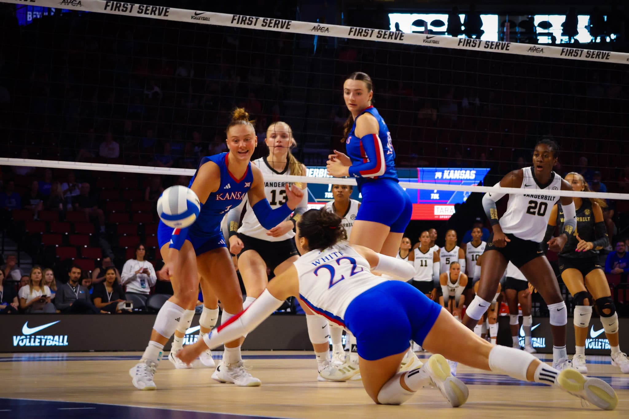 Kansas volleyball players competing in a match at AVCA First Serve