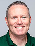 Brandon Mueller of Illinois Wesleyan is a 2026 AVCA Division III Men's Volleyball Region Coach of the Year.
