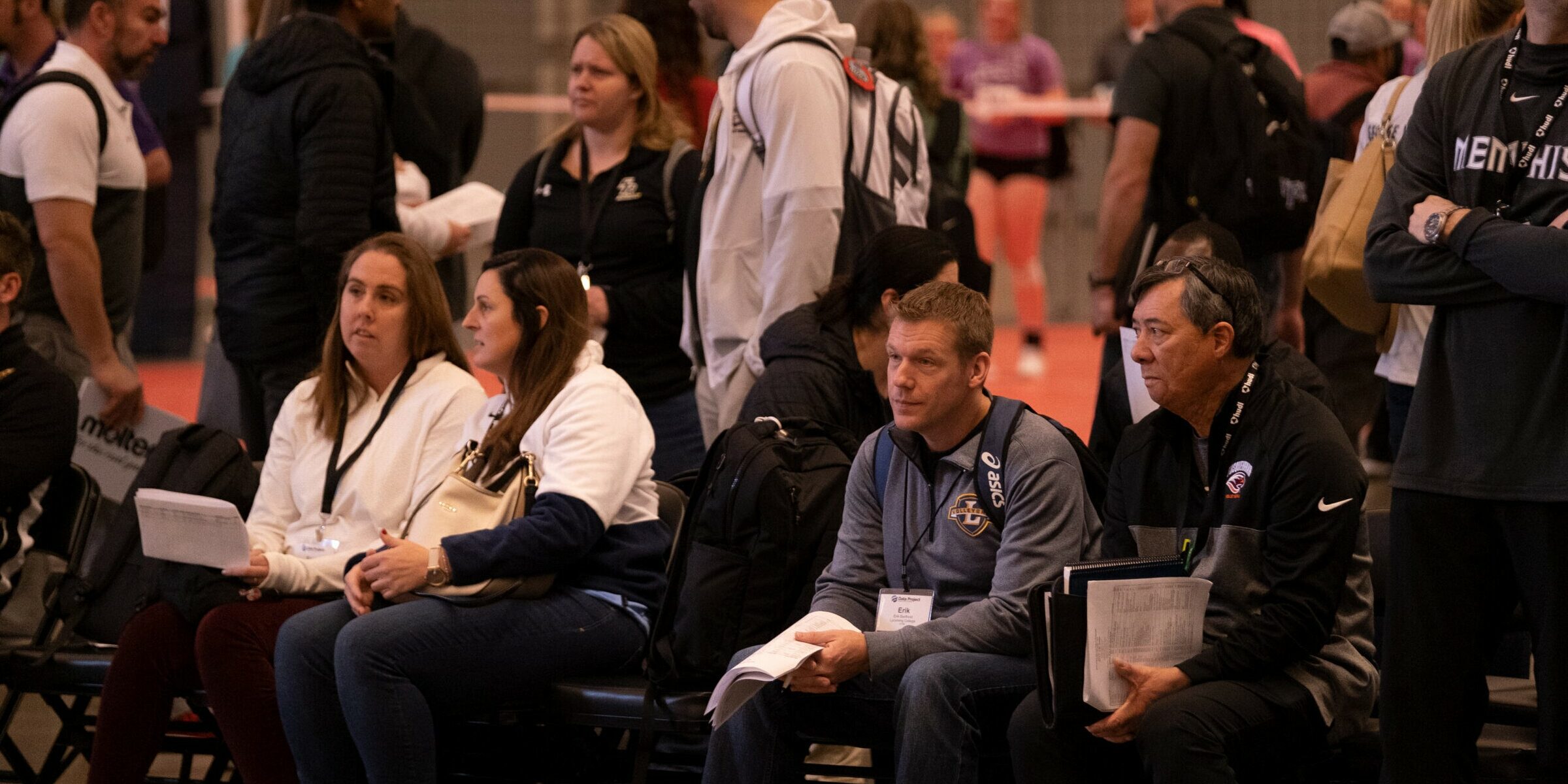 Collegiate coaches watch athletes taking part in AVCA Talent Showcases